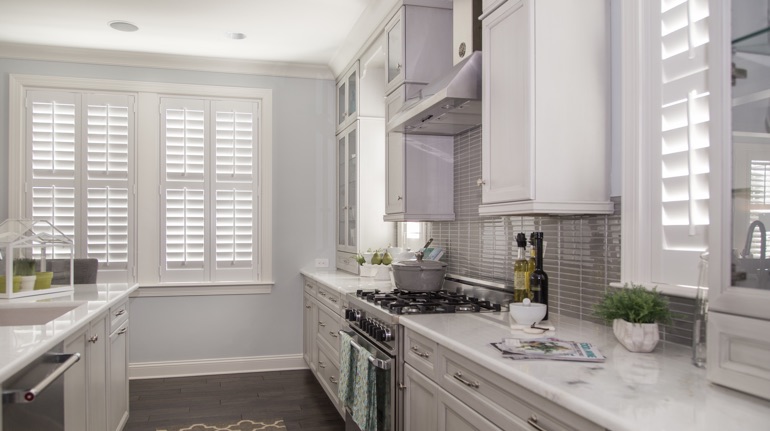 White shutters in Clearwater kitchen with modern appliances.